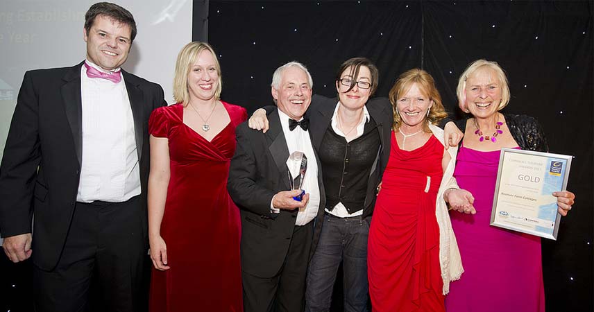 Group shot of the team at Bonsinver receiving an award