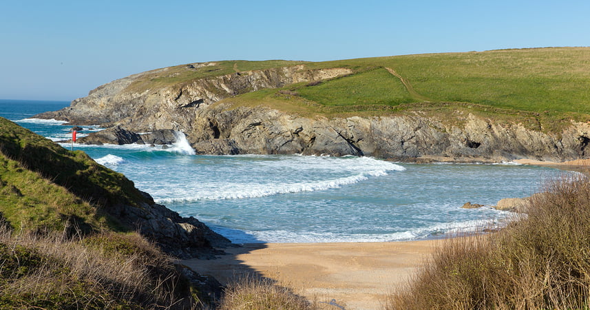 Porth Joke beach next to Crantock bay Cornwall England UK near Newquay and on South West Coast Path also known as Polly Joke in spring with blue sea and sky