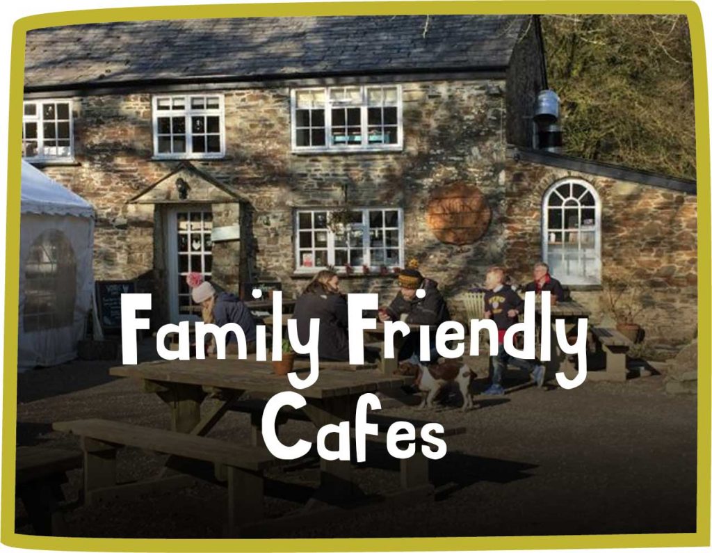 green framed image of the outside of a stone work cafe, families sit in the sun. White text reads 'family friendly cafes'