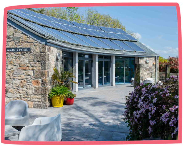 Photo of the exterior of the swimming pool building at Bosinver.