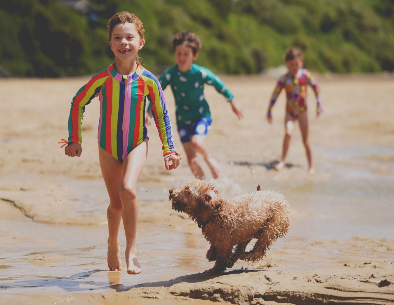 children on crantock beach