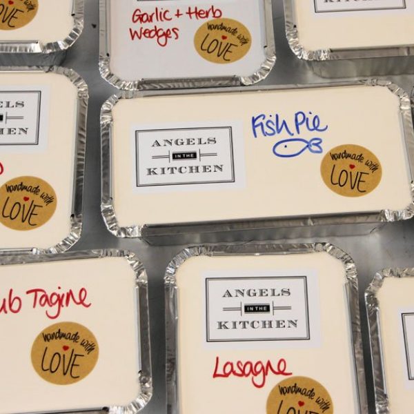 A selection of frozen meals in foil packages.